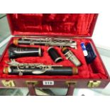 A SUPER GRADUATE RUDALL CARTE CASED CLARINET.