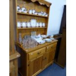 A SMALL PINE DRESSER.