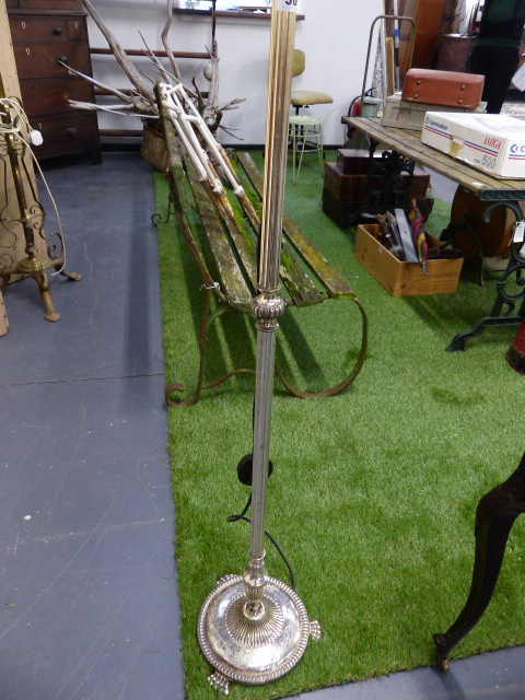 A SILVER PLATED STANDARD LAMP.