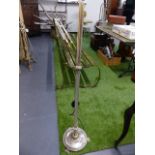 A SILVER PLATED STANDARD LAMP.