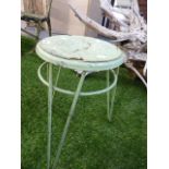 A RETRO PIN LEG STOOL.