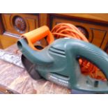 A HEDGE TRIMMER.