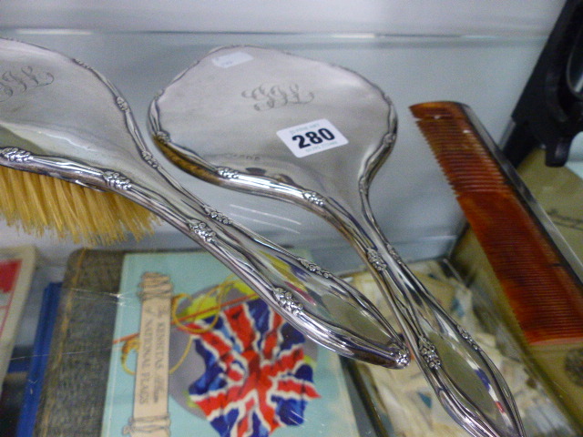 A SILVER BACK DRESSING TABLE SET.