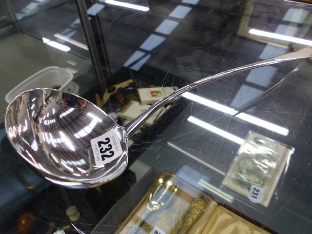 A LARGE GEORGIAN HALLMARKED SILVER LADLE.