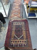 AN ANTIQUE PERSIAN HAMADAN RUNNER. 292 x 79cms AND A BELOUCH PRAYER RUG.