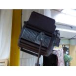 A VINTAGE LARGE FRENCH LTM THEATRE OR STAGE SPOTLIGHT TOGETHER WITH VARIOUS SCREENS AND LENSES. H.