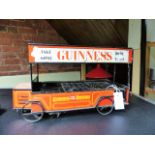 A NOVELTY GUINNESS "BUS" BOTTLE CRATE