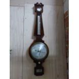 A REGENCY MAHOGANY AND BOXWOOD STRUNG FOUR GLASS WALL BAROMETER WITH SILVERED DIALS SIGNED D.