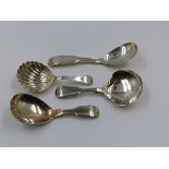 THREE SILVER HALLMARKED AND ONE WHITE METAL CADDY SPOON OF VARIOUS DATES AND STYLES TO INCLUDE A