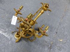 A FRENCH GILT ORMOLU FIVE BRANCH CHANDELIER.