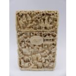 A FINELY CARVED CANTONESE IVORY CARD CASE DECORATED WITH SCENES OF FIGURES AND BUILDINGS IN