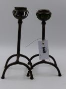 A NEAR PAIR OF BRONZE TIFFANY STUDIOS ORGANIC ROOT PATTERN CANDLESTICKS WITH BLOWN GLASS SOCKETS AND