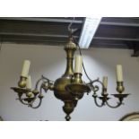 A PAIR OF LARGE BRASS DUTCH STYLE TEN BRANCH CHANDELIERS TOGETHER WITH A SIMILAR SMALLER SIX