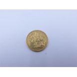 AN 1887 VICTORIAN FULL GOLD SOVEREIGN COIN.