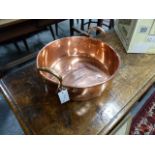 A 19th.C.COPPER TWIN HANDLED COOKING PAN.