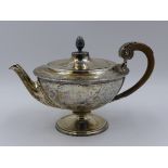 AN EDWARDIAN SILVER HALLMARKED FOOTED TEAPOT. MARKERS MARK JAMES DIXON & SONS LTD, DATED 1918.