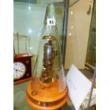A HERMLE EIGHT DAY SKELETON CLOCK WITH CONICAL GLASS DOME COVER.