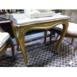 AN ANTIQUE FRENCH CARVED GILTWOOD OCCASIONAL TABLE WITH GLASS INSET TOP. 70 x 52 x 67cms.