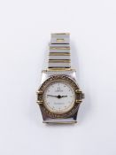 A LADIES OMEGA CONSTELLATION WATCH WITH A WHITE DIAL AND A DIAMOND SET BEZEL. BRACELET REFERENCE