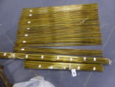 A SET OF BRASS ROUND SECTION STAIR RODS, APPROX. D.9mms, 50 x L.84cms, 20 x L.69cms, 4 x L.99cms,