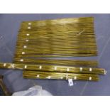 A SET OF BRASS ROUND SECTION STAIR RODS, APPROX. D.9mms, 50 x L.84cms, 20 x L.69cms, 4 x L.99cms,