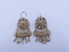 A PAIR OF PRECIOUS YELLOW METAL ORNATE BAROQUE PEARL CHANDELIER EARRINGS ON A HINGED WIRE