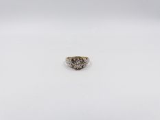 AN 18ct GOLD DIAMOND SINGLE STONE RING IN AN ORNATE VINTAGE STYLE MOUNT.