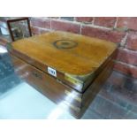 A VICTORIAN OAK AND BRASS BOUND WRITING BOX WITH FOLD OUT WRITING SLOPE AND BASE DRAWER. W.37cms.