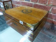 A VICTORIAN OAK AND BRASS BOUND WRITING BOX WITH FOLD OUT WRITING SLOPE AND BASE DRAWER. W.37cms.