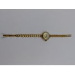 A LADIES 9ct GOLD MANUAL WOUND CYMA WATCH. THE CASE HAS A CHESTER TOWN MARK DATED 1961.