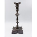AN 18th C. CAST SILVER CANDLESTICK WITH CRESTED MARK. DATED 1762, TOWN MARK LONDON, MAKER E.