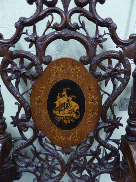 A 19th.C.SWISS BLACK FOREST CARVED AND INLAID ARMCHAIR WITH UNUSUAL SPRUNG SEAT AND INTEGRAL - Image 5 of 48