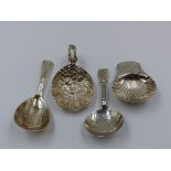 FOUR SILVER HALLMARKED CADDY SPOONS TO INCLUDE A WILLIAM IV 1835, A 1901 VINE LEAF AND GRAPE