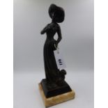 A BRONZE FIGURAL GROUP OF AN ELEGANT LADY WITH HER DOG ON MARBLE BASE. H. 38cms.
