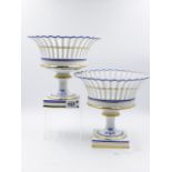 A PAIR OF FRENCH OLD PARIS FRUIT STANDS WITH BLUE AND GILT DECORATION, CRESTED. H.21cms.