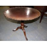 A GEORGIAN MAHOGANY TRIPOD TABLE WITH PIE CRUST DISH TOP