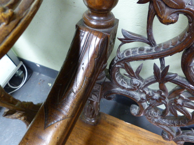 A 19th.C.SWISS BLACK FOREST CARVED AND INLAID ARMCHAIR WITH UNUSUAL SPRUNG SEAT AND INTEGRAL - Image 15 of 48