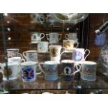 A LARGE COLLECTION OF COMMEMERATIVE CUPS AND MUGS
