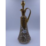 A LATE 19th.C. FRENCH GLASS DECANTER AND STOPPER EMBELLISHED WITH GILDING. 39cms. HIGH.