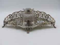 A LATE VICTORIAN SILVER DESK INKSTAND WITH PIERCED BACK, DATED 1895 LONDON, MAKER GOLDSMITHS AND