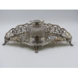 A LATE VICTORIAN SILVER DESK INKSTAND WITH PIERCED BACK, DATED 1895 LONDON, MAKER GOLDSMITHS AND