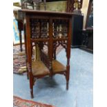 AN ANTIQUE LIBERTY'S STYLE MAHOGANY TWO TIER TABLE. 45 x 45 x 67cms.
