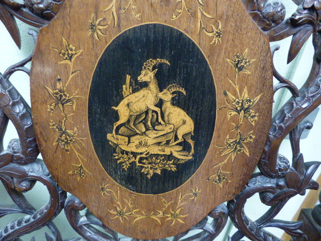 A 19th.C.SWISS BLACK FOREST CARVED AND INLAID ARMCHAIR WITH UNUSUAL SPRUNG SEAT AND INTEGRAL - Image 4 of 48