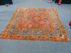 AN ANTIQUE TURKISH USHAK SMALL CARPET. 216 x 200cms.