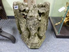 AN 18th.C.CARVED STONE ELEMENT DEPICTING A WINGED DRAGON.