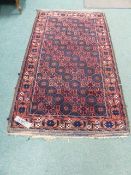 AN ANTIQUE BELOUCH RUG. 204 x 115cms.