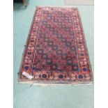 AN ANTIQUE BELOUCH RUG. 204 x 115cms.