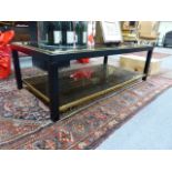 A GOOD QUALITY ART DECO STYLE GLASS TOP TWO TIER COFFEE TABLE. THE TOP 125 x 65cms, H.41cms.