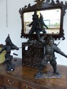 THREE BRONZE FIGURES OF SAMURAI WARRIORS, EACH HOLDING A DIFFERENT WEAPON. H.57cms.