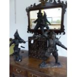 THREE BRONZE FIGURES OF SAMURAI WARRIORS, EACH HOLDING A DIFFERENT WEAPON. H.57cms.